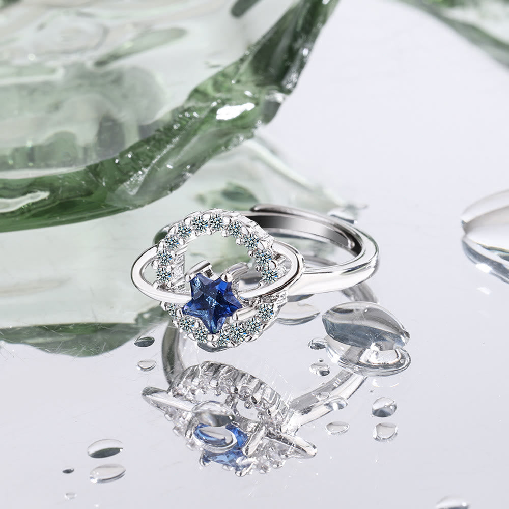 Olivenorma Anello regolabile con pentagramma, topazio blu e zircone bianco