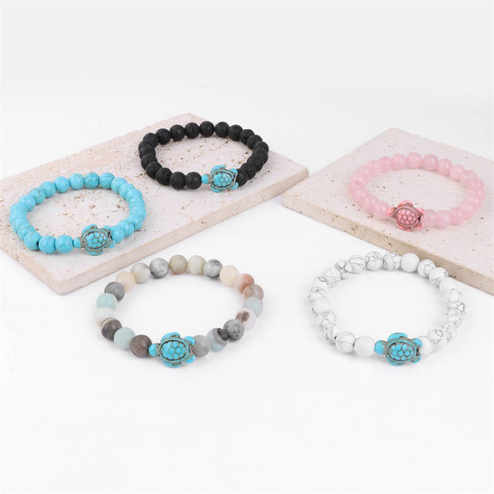 Olivenorma "Sense of Flow" - Bracciale semplice in pietra naturale con tartaruga turchese 