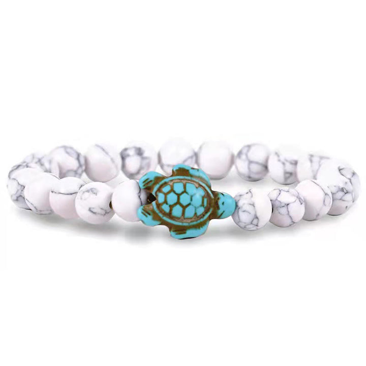 Olivenorma "Sense of Flow" - Bracciale semplice in pietra naturale con tartaruga turchese 