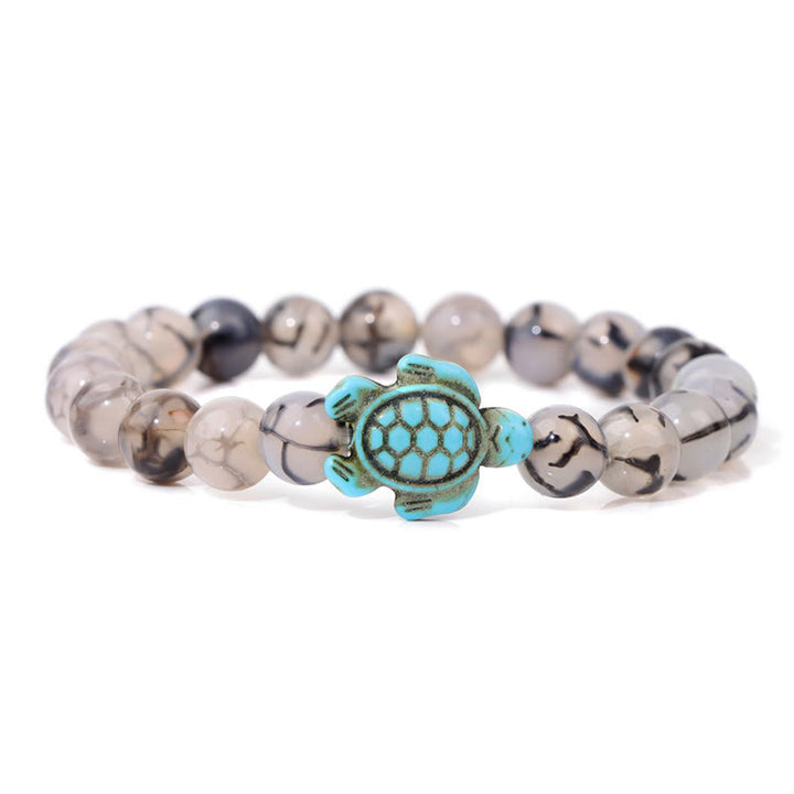 Olivenorma "Sense of Flow" - Bracciale semplice in pietra naturale con tartaruga turchese 