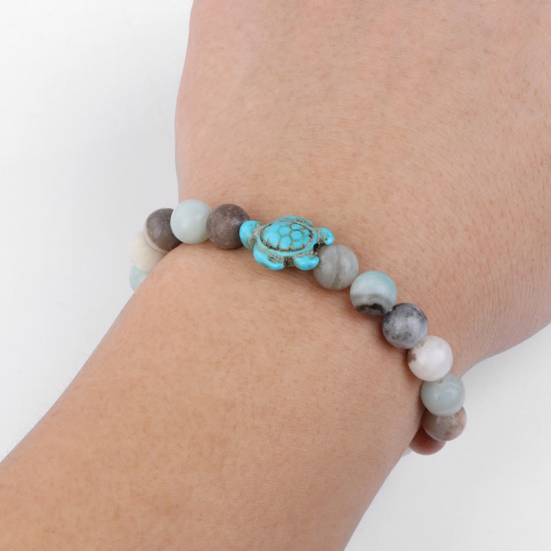 Olivenorma "Sense of Flow" - Bracciale semplice in pietra naturale con tartaruga turchese 