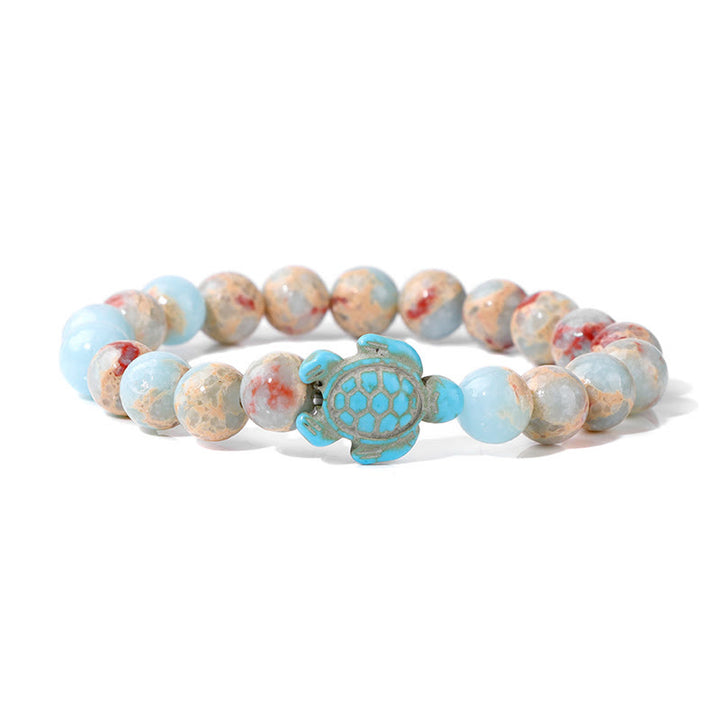Olivenorma "Sense of Flow" - Bracciale semplice in pietra naturale con tartaruga turchese 