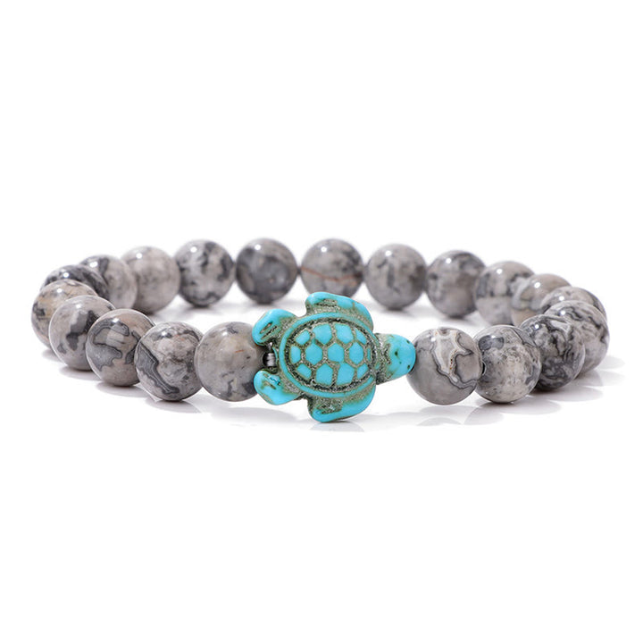 Olivenorma "Sense of Flow" - Bracciale semplice in pietra naturale con tartaruga turchese 