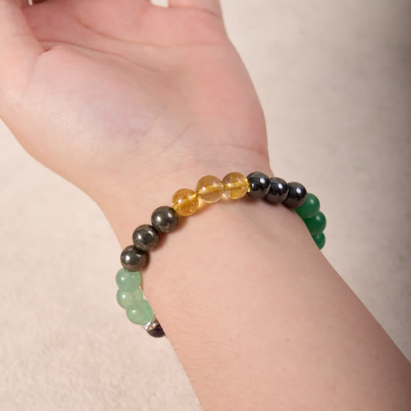 Bracciale Olivenorma con perline di ematite, avventurina verde, ametista e citrino 