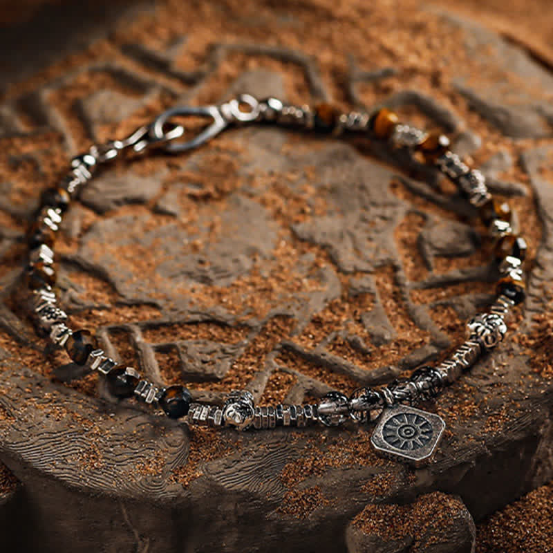 Bracciale Olivenorma in quarzo nero rutilato con perline di occhio di tigre 