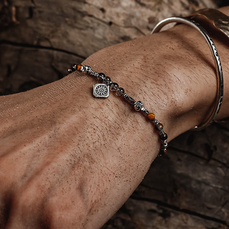 Bracciale Olivenorma in quarzo nero rutilato con perline di occhio di tigre 