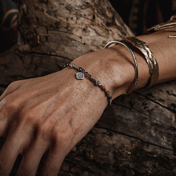 Bracciale Olivenorma in quarzo nero rutilato con perline di occhio di tigre 