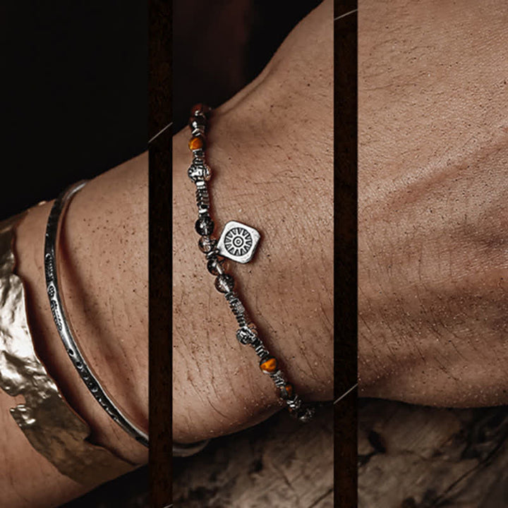 Bracciale Olivenorma in quarzo nero rutilato con perline di occhio di tigre 