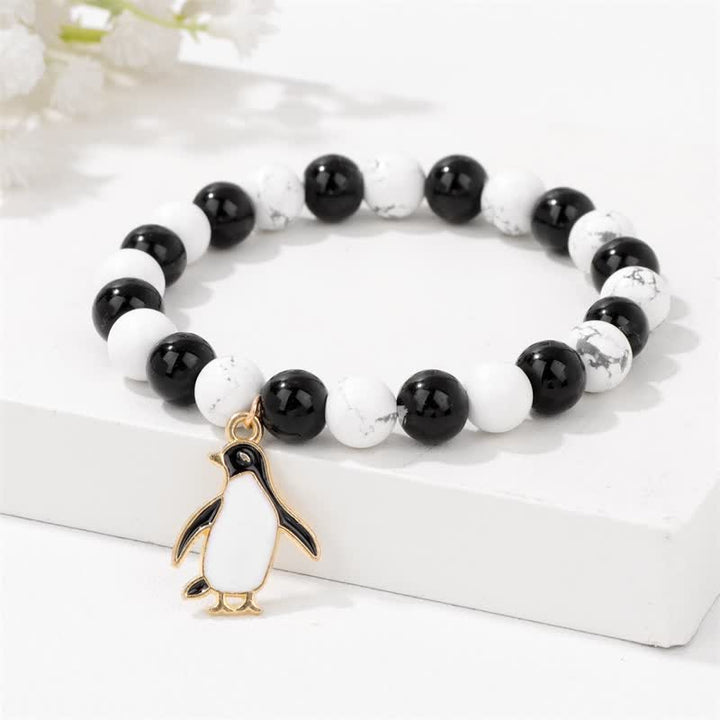 Olivenorma Bracciale con ciondolo a forma di pinguino con perline in pietra naturale da 8 mm