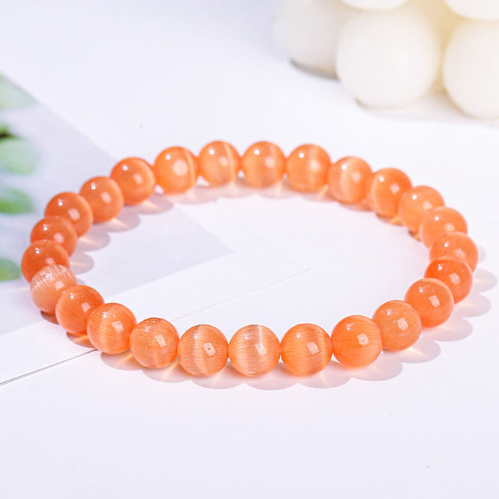 Olivenorma Braccialetto con perline in pietra colorata occhio di gatto da 6-10 mm - image 1