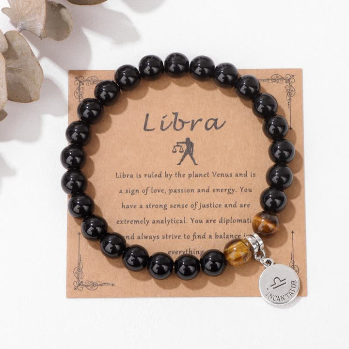 Bracciale con ciondolo zodiacale in perline di occhio di tigre in ossidiana Olivenorma
