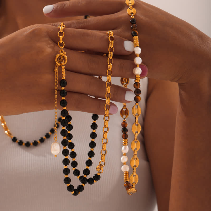 Collana in acciaio al titanio con perle d'acqua dolce e ossidiana con occhio di tigre Olivenorma