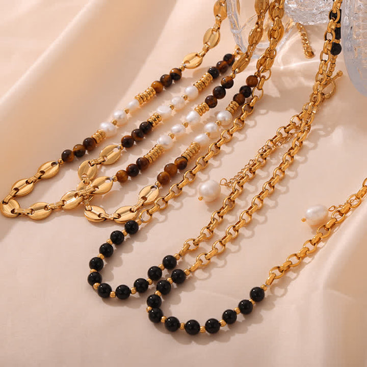 Collana in acciaio al titanio con perle d'acqua dolce e ossidiana con occhio di tigre Olivenorma