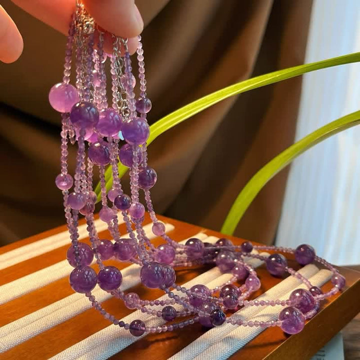 Collana con clavicola Olivenorma in ametista naturale, perle grandi e piccole