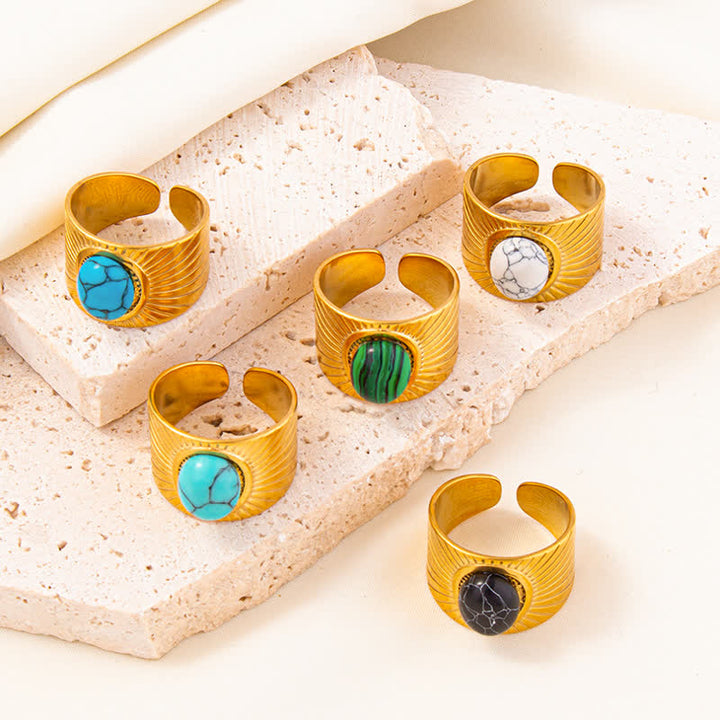 Olivenorma Anello largo regolabile in pietra naturale ovale intarsiata