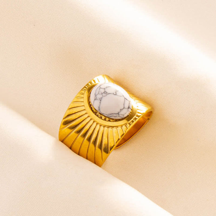 Olivenorma Anello largo regolabile in pietra naturale ovale intarsiata