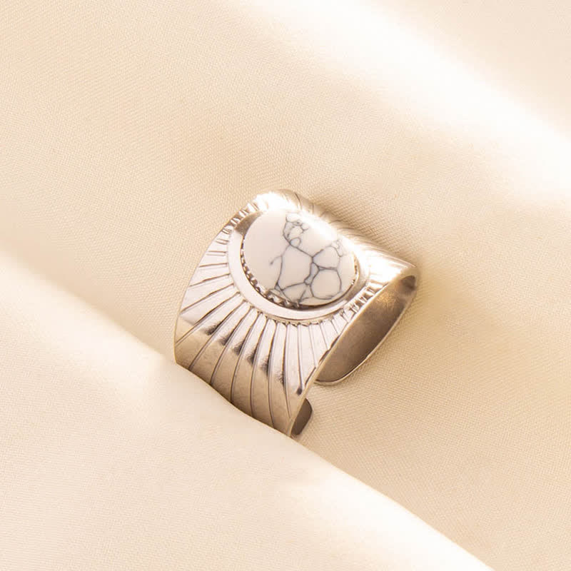 Olivenorma Anello largo regolabile in pietra naturale ovale intarsiata