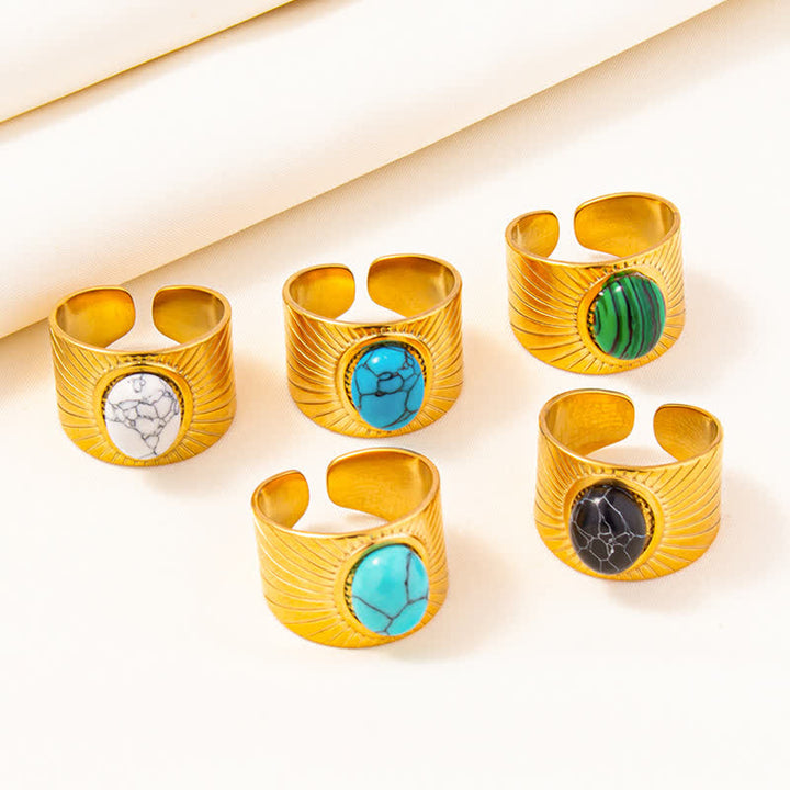 Olivenorma Anello largo regolabile in pietra naturale ovale intarsiata