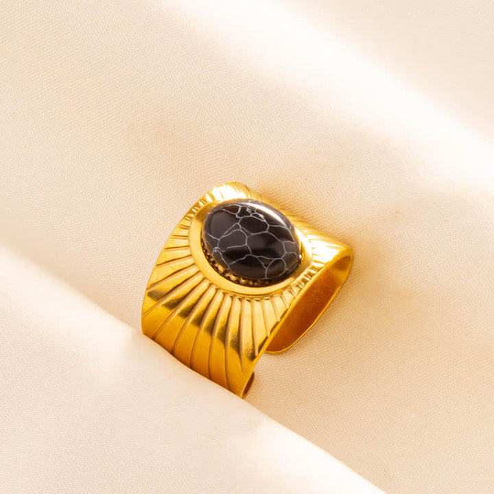 Olivenorma Anello largo regolabile in pietra naturale ovale intarsiata