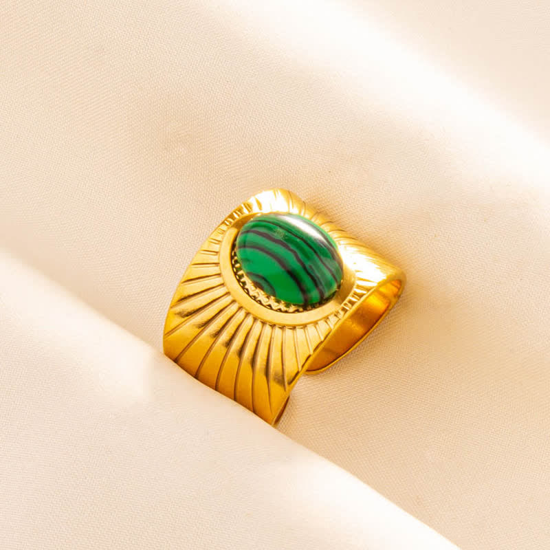 Olivenorma Anello largo regolabile in pietra naturale ovale intarsiata