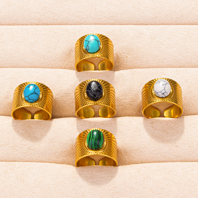 Olivenorma Anello largo regolabile in pietra naturale ovale intarsiata