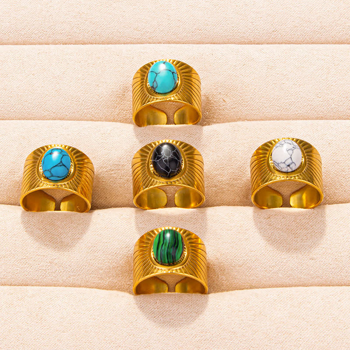 Olivenorma Anello largo regolabile in pietra naturale ovale intarsiata