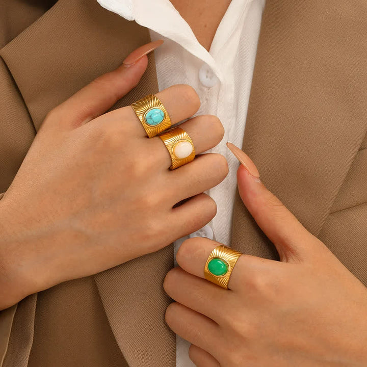 Olivenorma Anello largo regolabile in pietra naturale ovale intarsiata