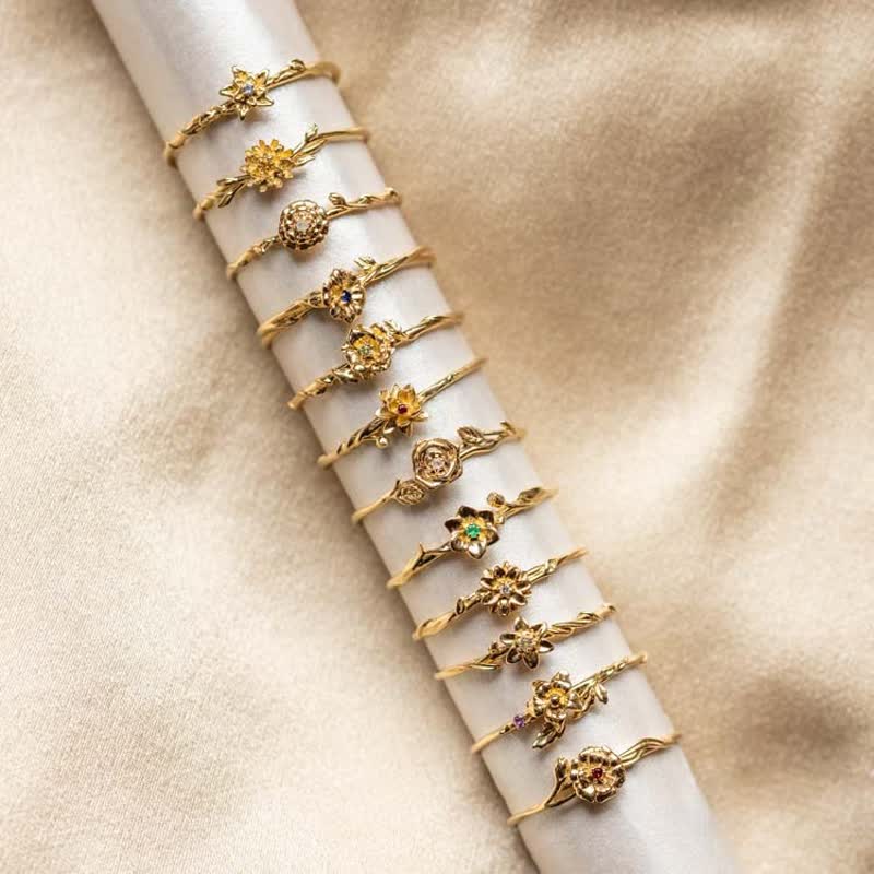 Olivenorma Anello in oro con fiore di nascita delicato