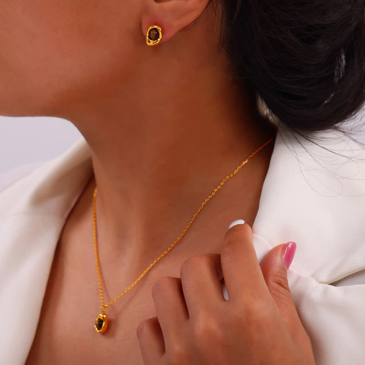 Olivenorma Set di gioielli in acciaio al titanio irregolare con occhio di tigre naturale 