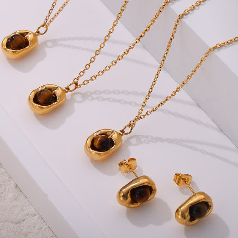 Olivenorma Set di gioielli in acciaio al titanio irregolare con occhio di tigre naturale 