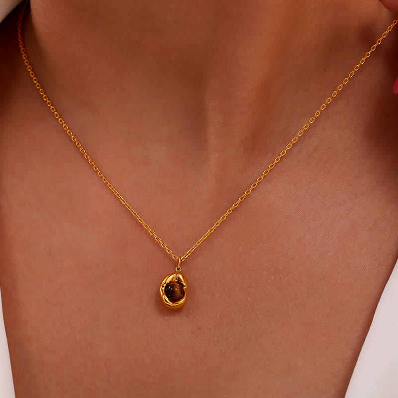 Olivenorma Set di gioielli in acciaio al titanio irregolare con occhio di tigre naturale 