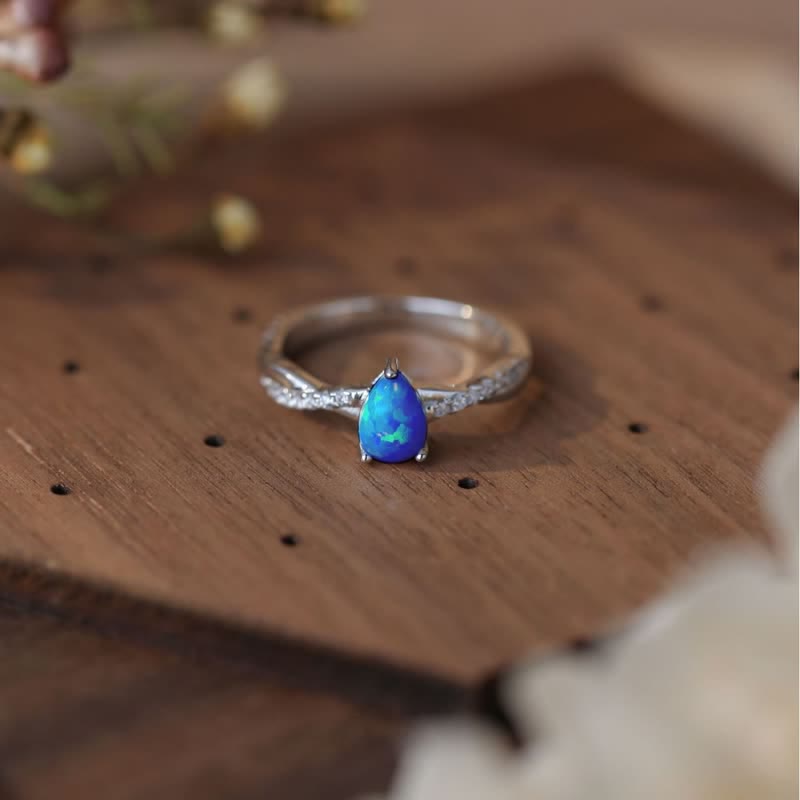 Olivenorma Goccia d'acqua Opale blu Zircone bianco