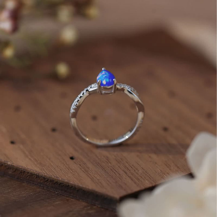 Olivenorma Goccia d'acqua Opale blu Zircone bianco
