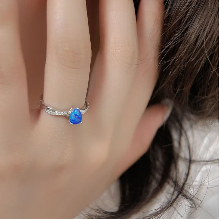 Olivenorma Goccia d'acqua Opale blu Zircone bianco