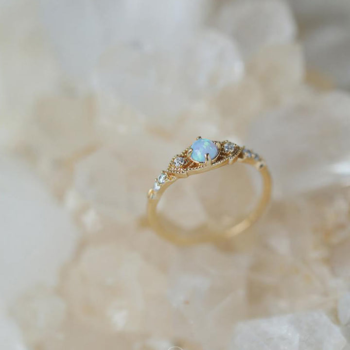Anello Olivenorma europeo retrò con opale e zirconi