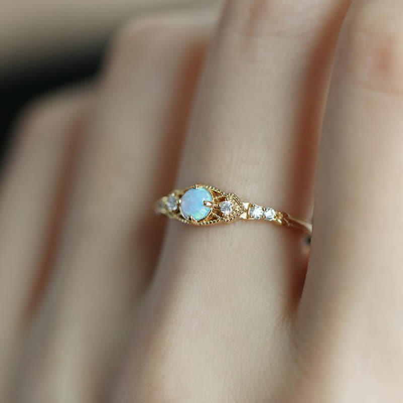 Anello Olivenorma europeo retrò con opale e zirconi