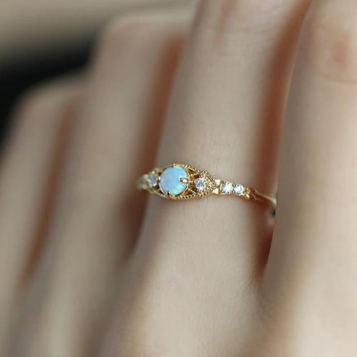 Anello Olivenorma europeo retrò con opale e zirconi