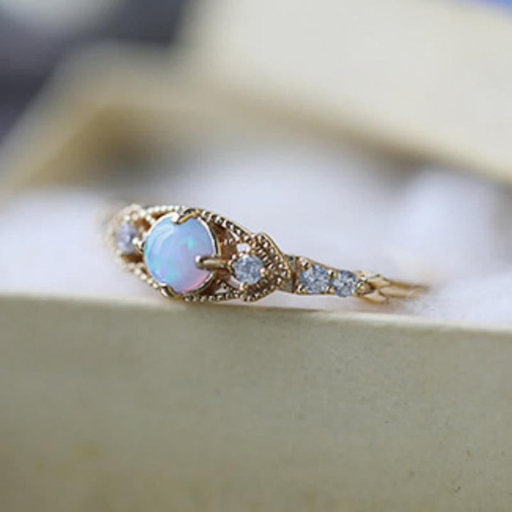 Anello Olivenorma europeo retrò con opale e zirconi