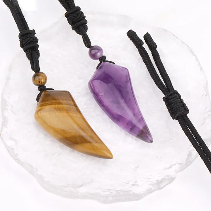 Collana con ciondolo a forma di dente di lupo in pietra naturale Olivenorma