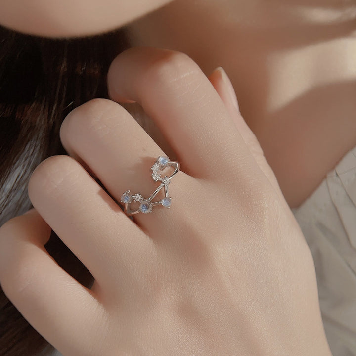 Anello con simbolo zodiacale in pietra di luna naturale Olivenorma