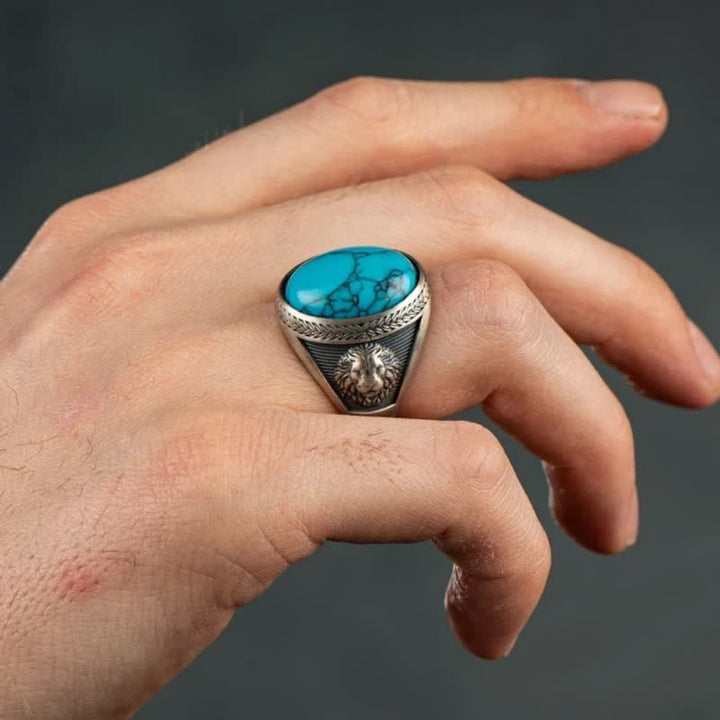 Anello da uomo Olivenorma con leone alato in turchese ovale