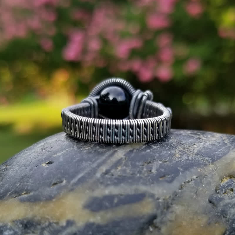 Olivenorma Anello da uomo con nodo in onice nero avvolto in filo