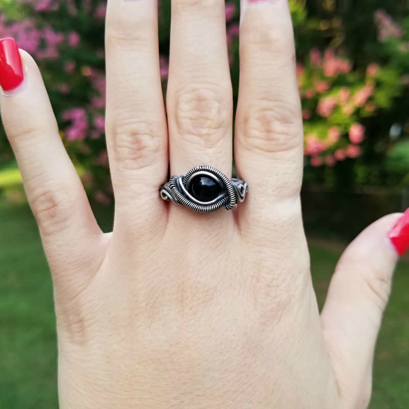 Olivenorma Anello da uomo con nodo in onice nero avvolto in filo