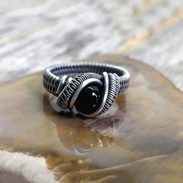 Olivenorma Anello da uomo con nodo in onice nero avvolto in filo