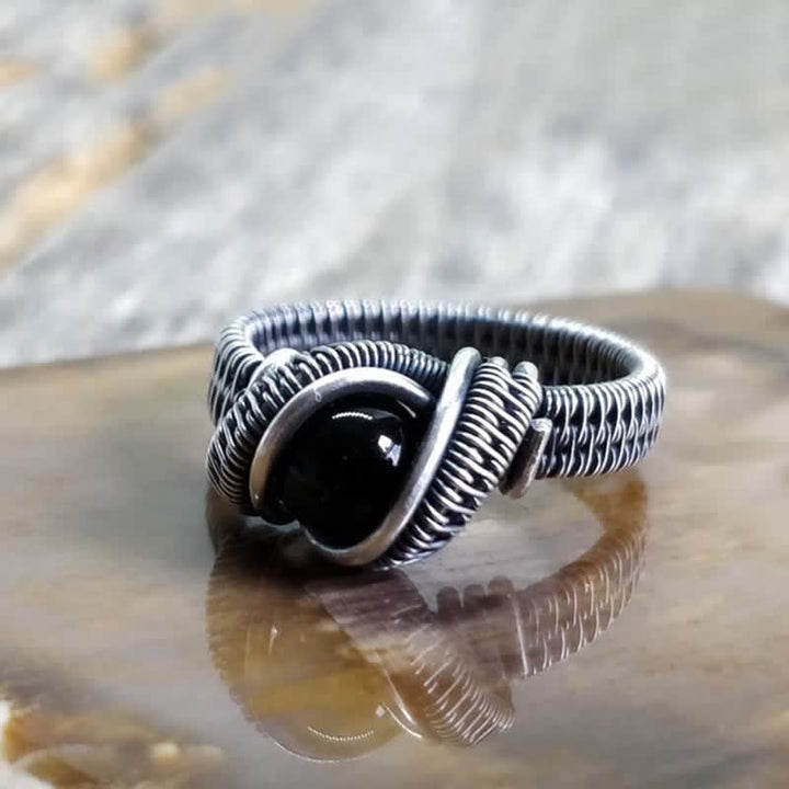 Olivenorma Anello da uomo con nodo in onice nero avvolto in filo
