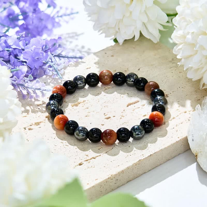 Braccialetto di perline in ematite e ossidiana con occhio di tigre arancione Olivenorma 
