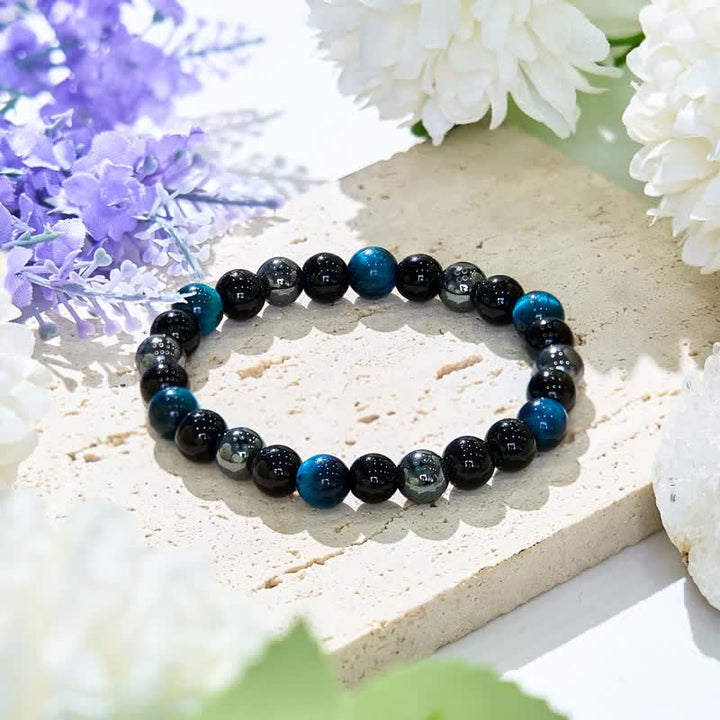 Bracciale Olivenorma con perline in ematite e ossidiana occhio di tigre blu 