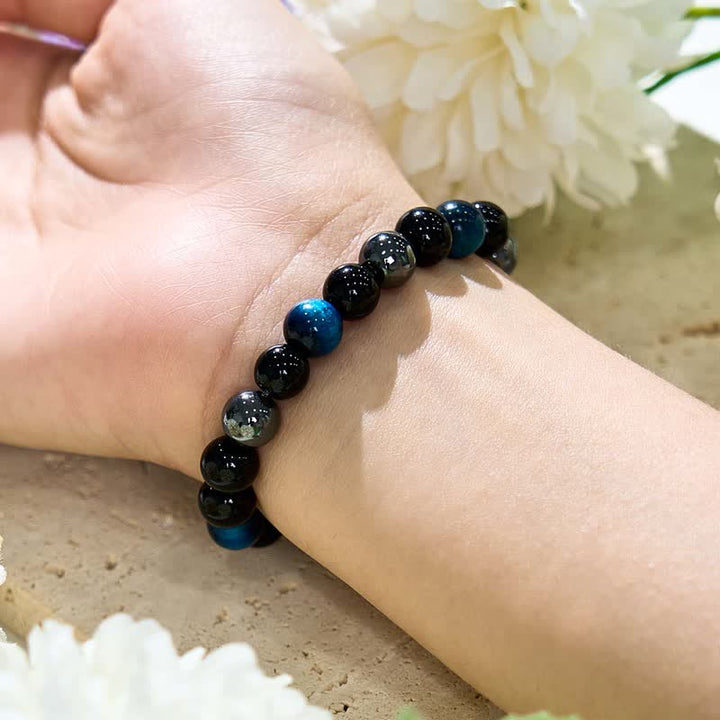 Bracciale Olivenorma con perline in ematite e ossidiana occhio di tigre blu 