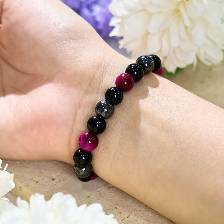 Bracciale Olivenorma con perline in ematite e ossidiana occhio di tigre rosso rosa 