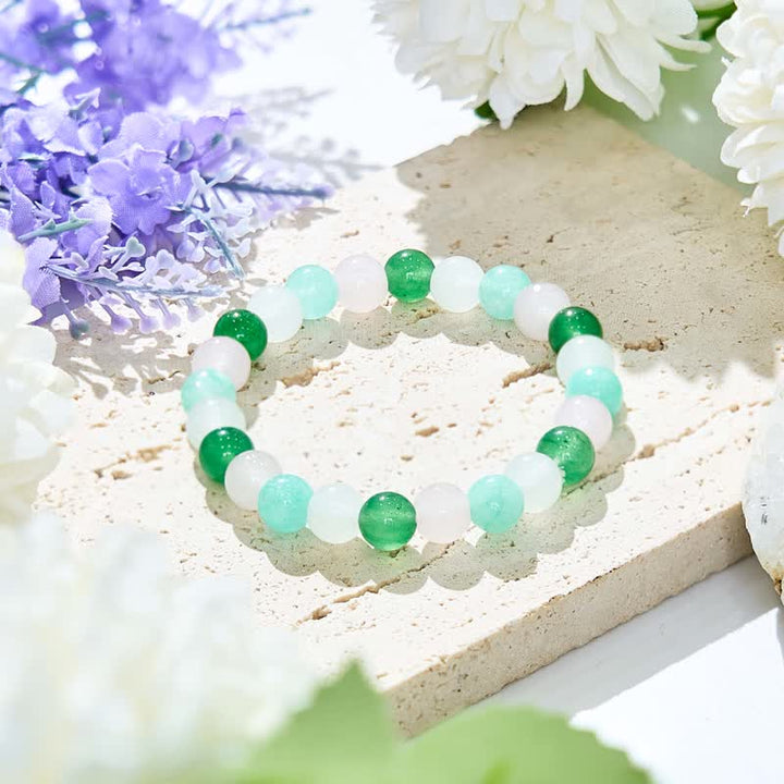 Bracciale Olivenorma con perline di quarzo rosa, fluorite verde e cristallo trasparente 